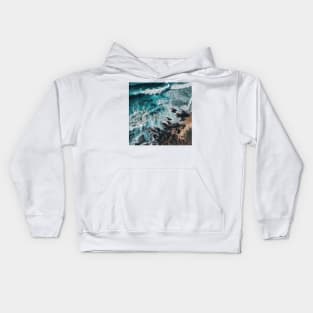 Rough sea waves white and sandy shore of the beach Kids Hoodie